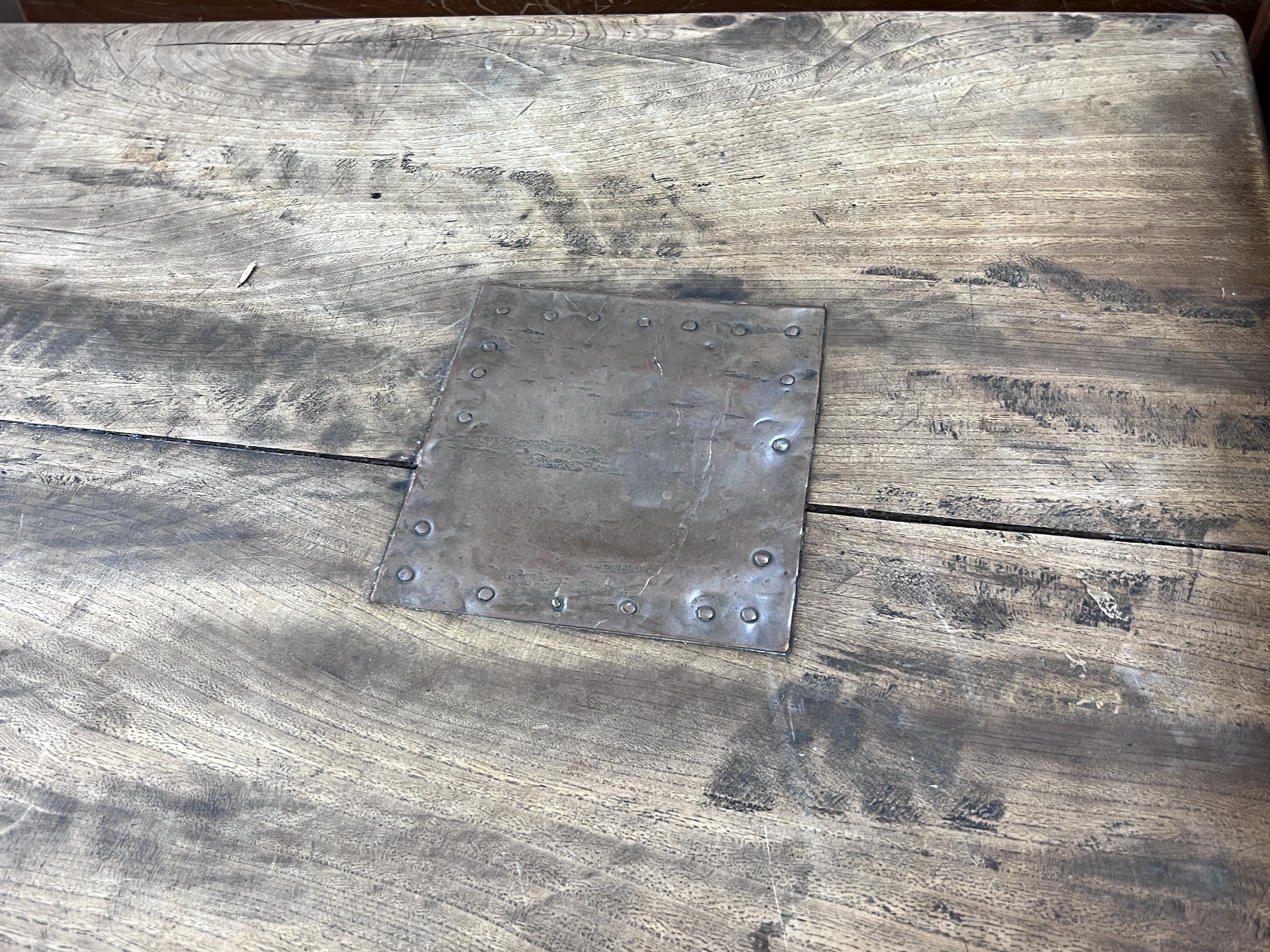 A small 18th century style rectangular elm refectory table, length 137cm, depth 64cm, height 70cm (severely warped)